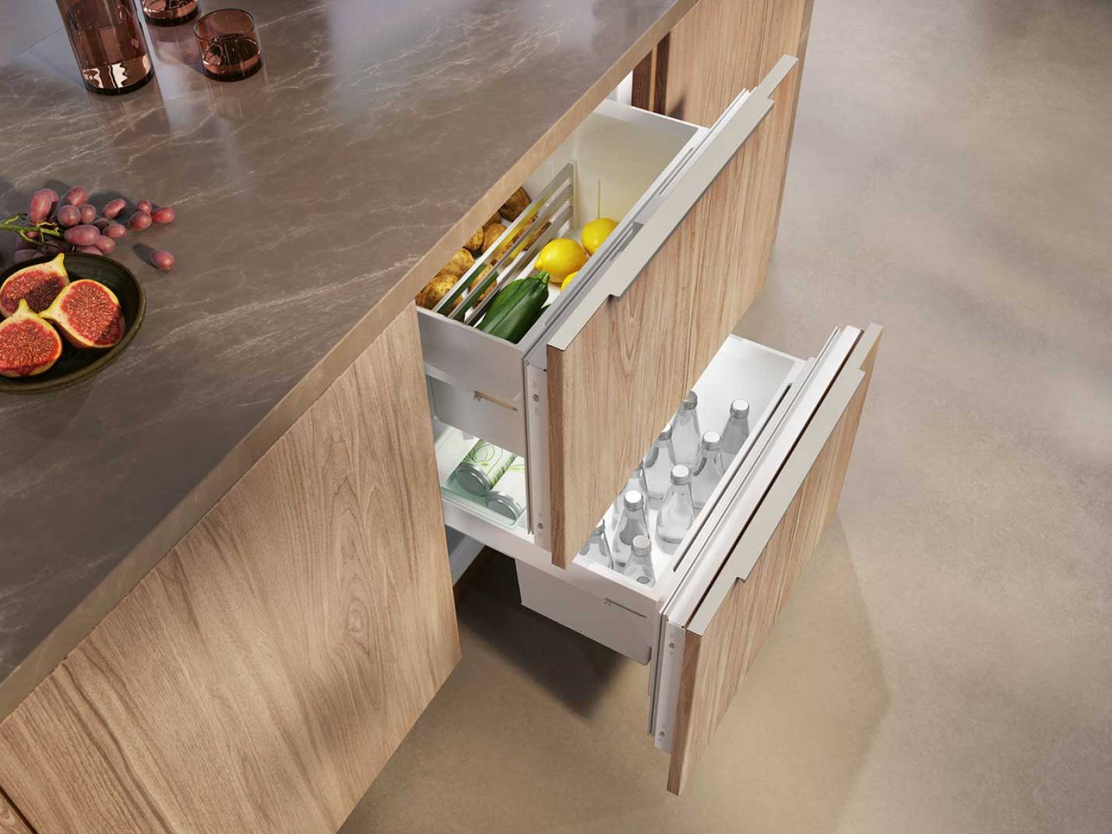 Klein gebaut, gross im Alltag: Der  neue Unterbau-­Kühlschrank «KU 7175 D» nutzt den Platz unter der Arbeits­fläche clever. Zwei Schubladen mit separat ­ein­stellbaren Temperaturzonen von 0 bis 14 °C halten ­Getränke eiskalt und Gemüse länger frisch – direkt neben dem Kochfeld und ohne Umwege. Gedacht als Kellerfach, Getränke­kühler oder praktische Ergänzung zum Hauptkühlschrank. MIELE.