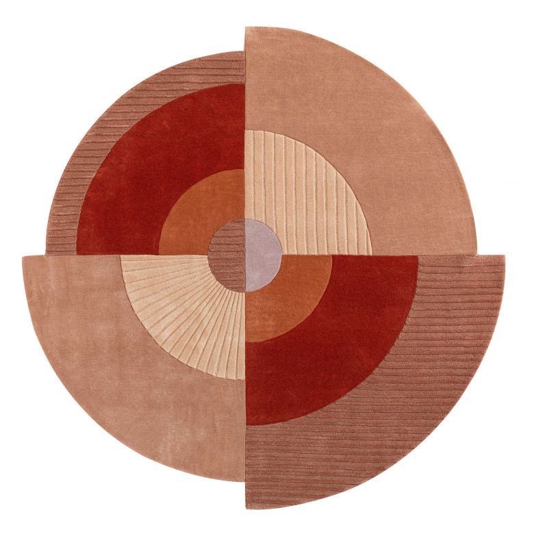 Rund und doch kein Kreis: Teppich «Merlin» spielt mit einfachen geometrischen Formen und erinnert dabei ebenso an das markante Design des Bauhauses wie an die meisterhafte Ästhetik des Art déco. Design: Alnoor. ROCHE-BOBOIS.COM