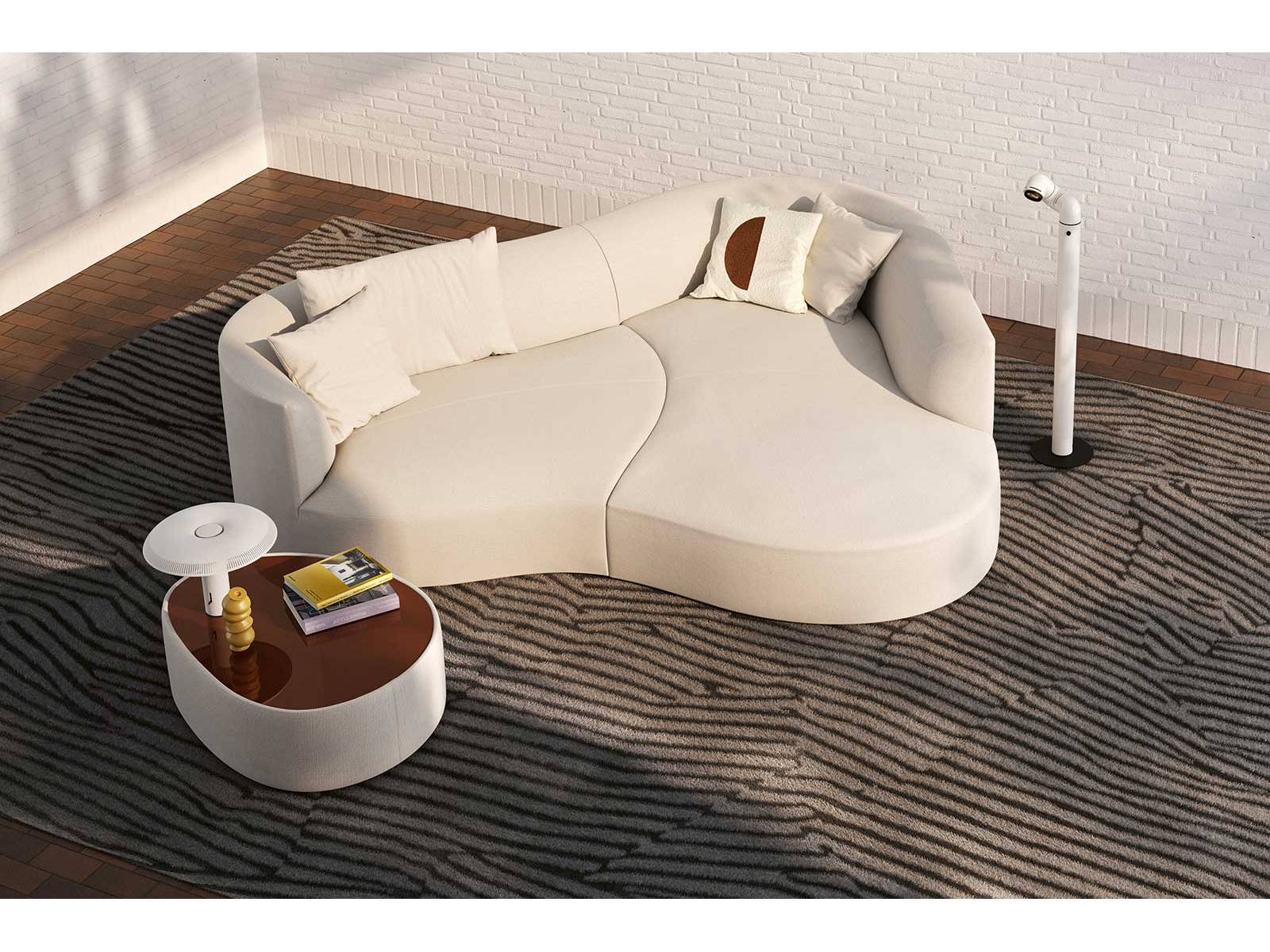 Mit sanft geschwungenen Formen erinnert das Sofa «Siwa» an eine Oase inmitten der Wüste und lädt dazu ein, im Alltag einen Ort der Gelassenheit und Begegnung zu finden. Design: Altherr Désile Park. COR.