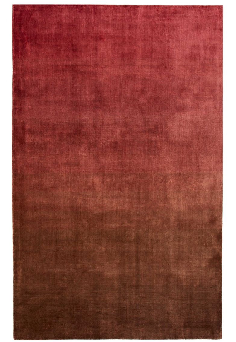 Das Teppichdesign von «Savoie Vintage Rose» in Vintage-Rosetönen basiert auf dem «Savoie Dip-Dye»-Stoff. Handgewebt aus Tencel-Viskose. DESIGNERSGUILD.COM